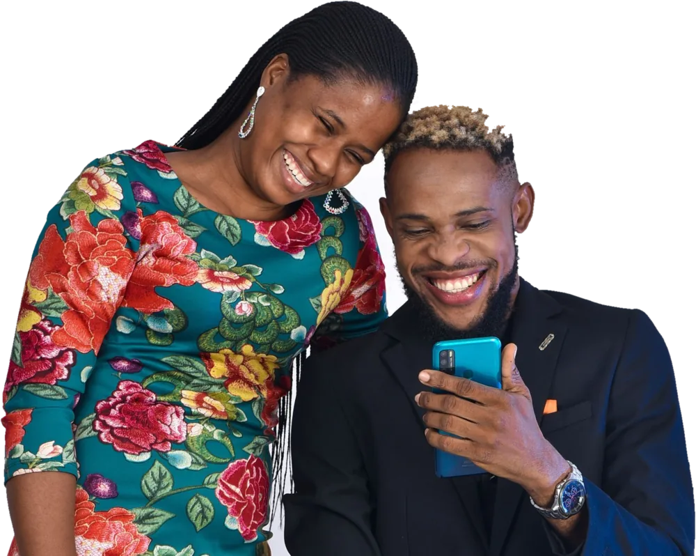 Two happy Smartrendz shoppers looking at a smartphone together